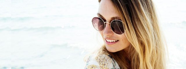 Optometrist, woman wearing sunglasses in Toronto, ON